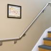 Shot of bottom of stairwell with mounted rail