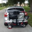 Harmar lift with Golden Tech three wheeled scooter