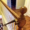 Interior shot at top of stairwell mounted on wood rail