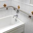 Wrap around tub rail